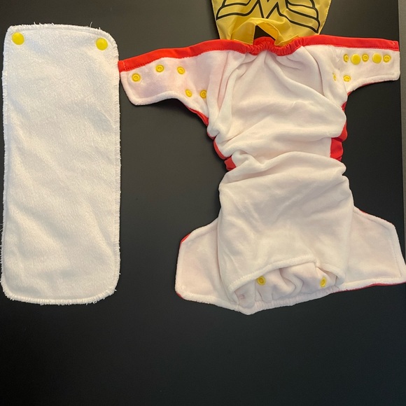 Bumpkins Cloth Diaper Snap All-In-One Pocket with Cape. - Picture 5 of 6